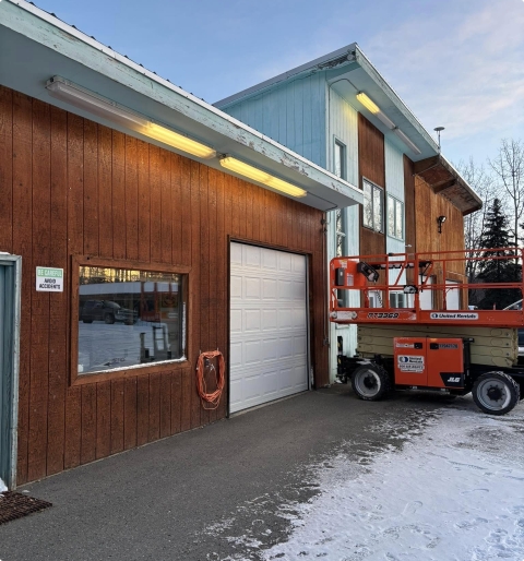Residential home under construction — rough-in wiring and framing for new build or addition