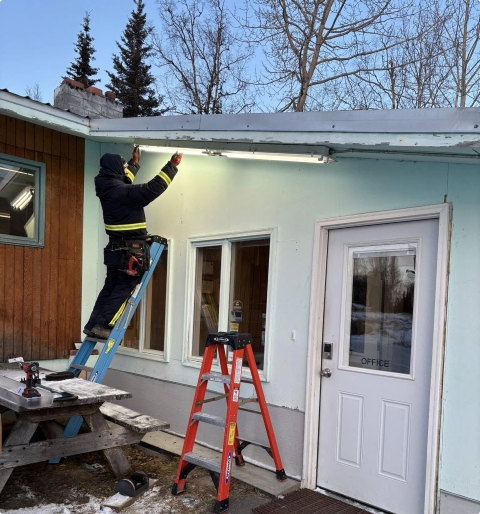 Residential home under construction — rough-in wiring and framing for new build or addition