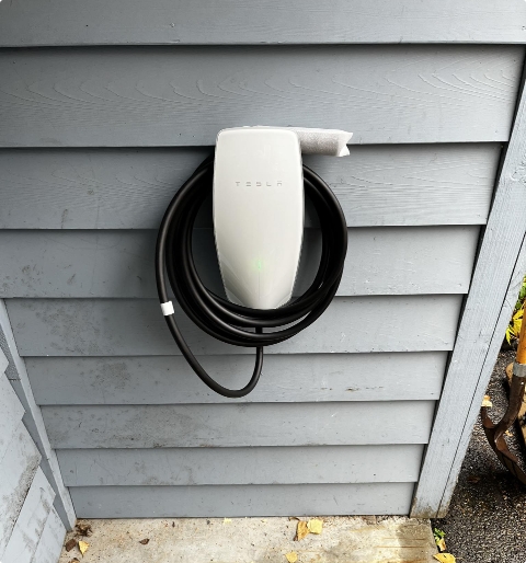 Residential home under construction — rough-in wiring and framing for new build or addition