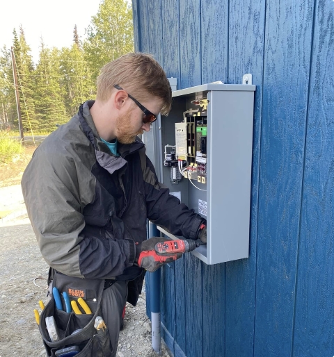 Residential home under construction — rough-in wiring and framing for new build or addition